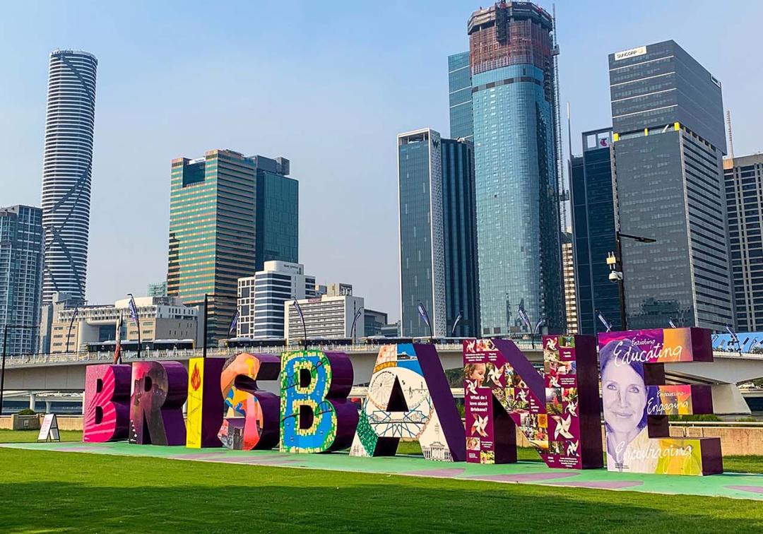 Brisbane sign with city in the background