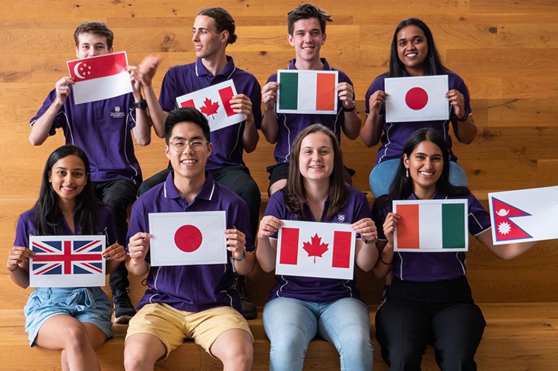 Students holding flags