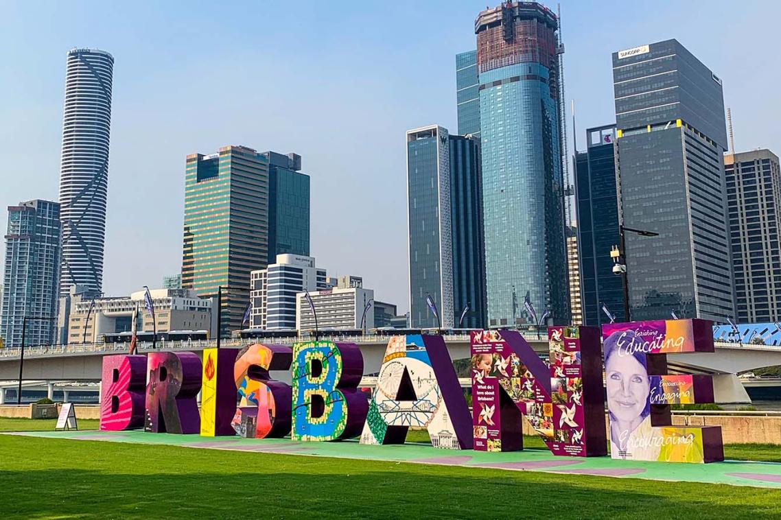 Brisbane sign with city in the background
